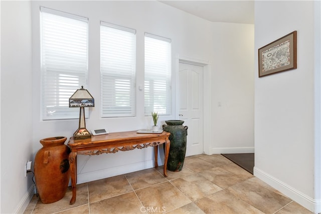 office area featuring light tile floors