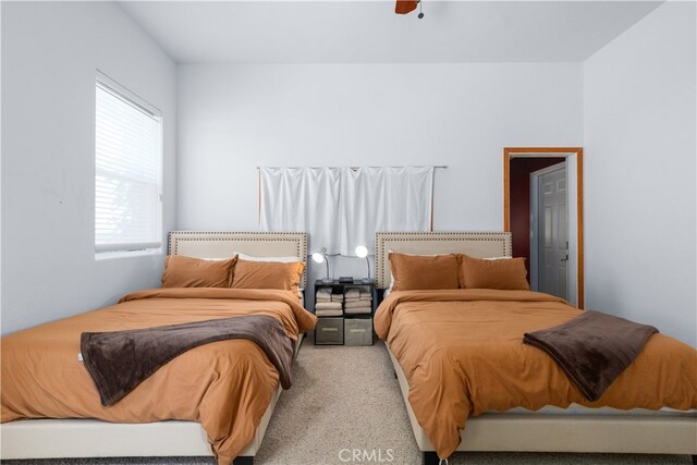 bedroom with carpet floors and ceiling fan