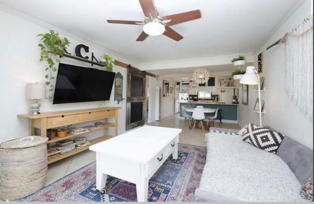 tiled living room with crown molding and ceiling fan