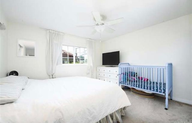 bedroom featuring carpet and ceiling fan