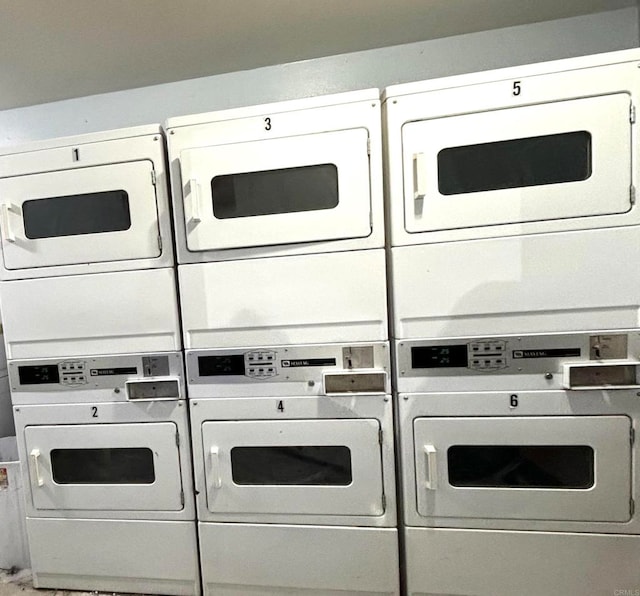 washroom featuring washer and dryer and stacked washer and clothes dryer