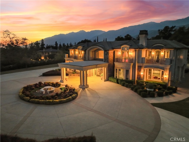 view of front of property with a mountain view