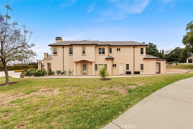 exterior space with a front lawn