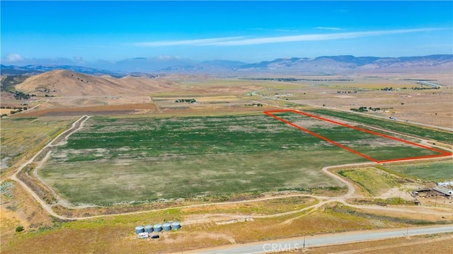 aerial view featuring a mountain view and a rural view