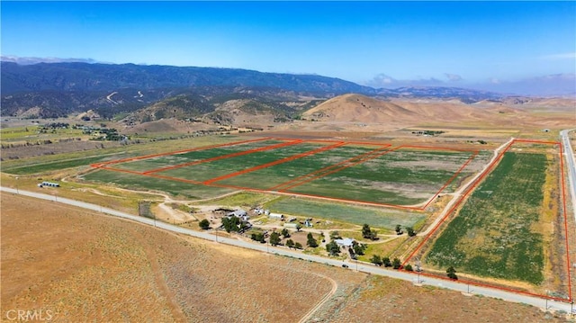 aerial view featuring a mountain view and a rural view