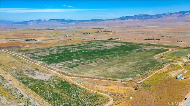 bird's eye view with a mountain view and a rural view