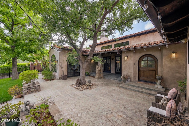 view of front facade with a patio