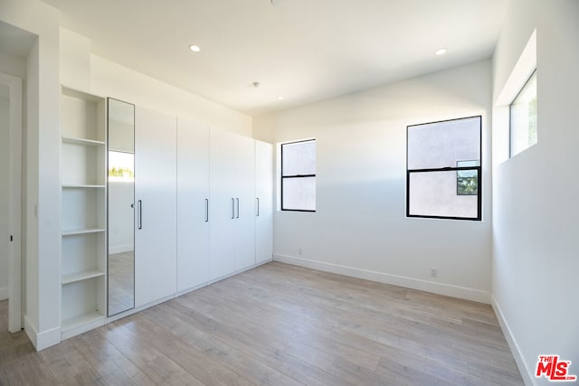 unfurnished bedroom featuring light hardwood / wood-style flooring