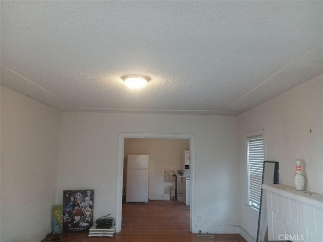 2123 High St, Oakland, CA 94601 - interior space with a textured ceiling and wood finished floors