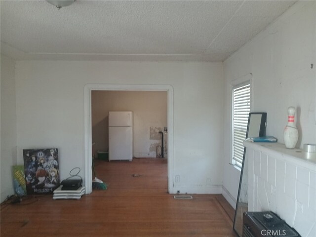 2123 High St, Oakland, CA 94601 - interior space with a textured ceiling and wood finished floors