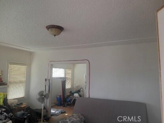 2123 High St, Oakland, CA 94601 - living area with a textured ceiling