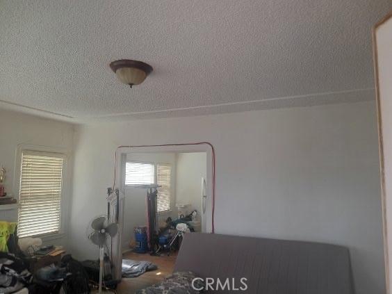 2123 High St, Oakland, CA 94601 - living room featuring a textured ceiling