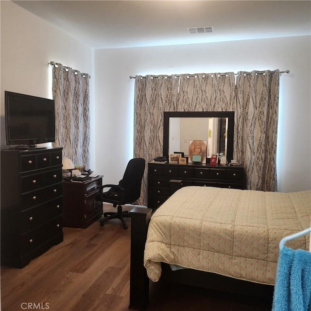 bedroom featuring hardwood / wood-style floors