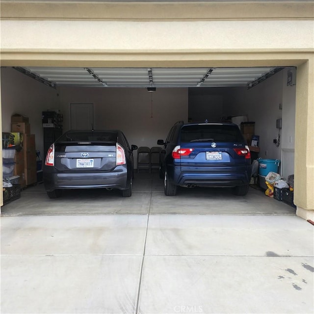 garage featuring a garage door opener