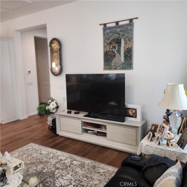 living room with dark wood-type flooring