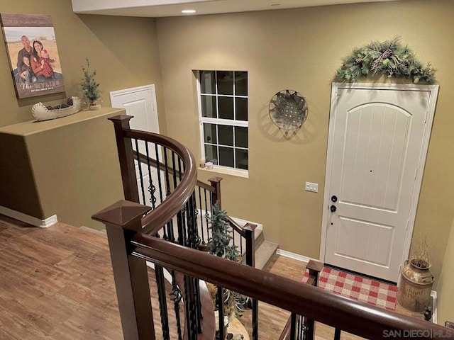 foyer entrance with wood-type flooring