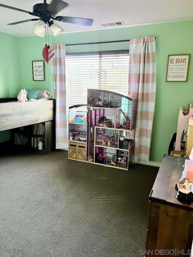 carpeted bedroom featuring ceiling fan