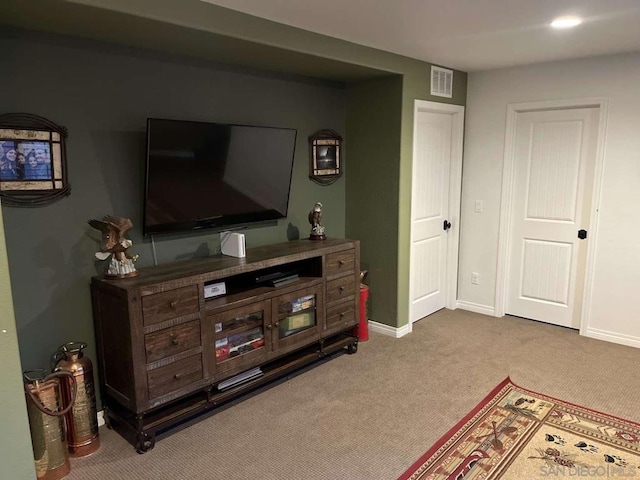 living room featuring light carpet