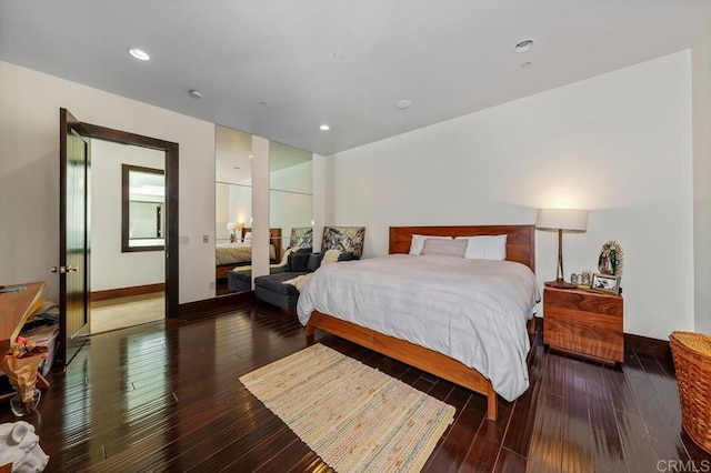 bedroom featuring dark wood-type flooring