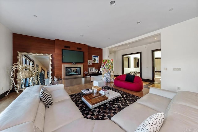 living room with wooden walls