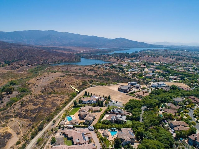 bird's eye view featuring a water and mountain view