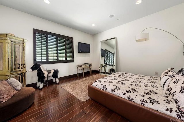 bedroom featuring dark wood-type flooring