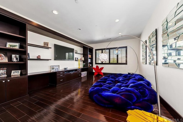 bedroom featuring built in desk