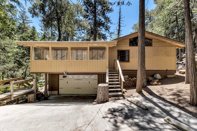 view of front of property featuring a garage