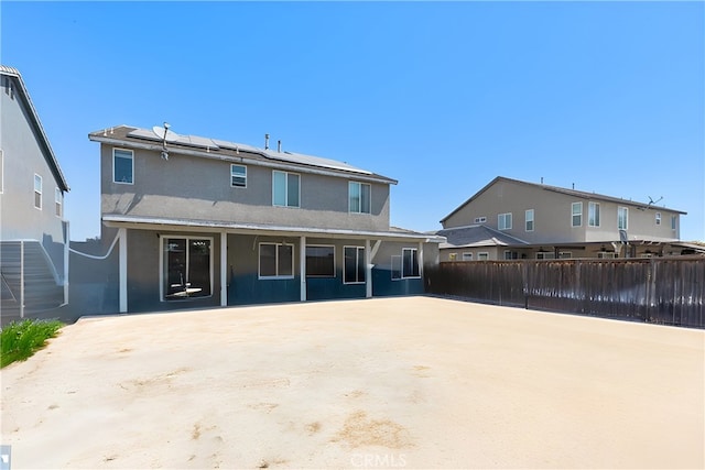 back of house featuring a patio