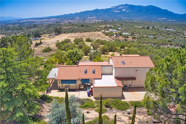 drone / aerial view with a mountain view