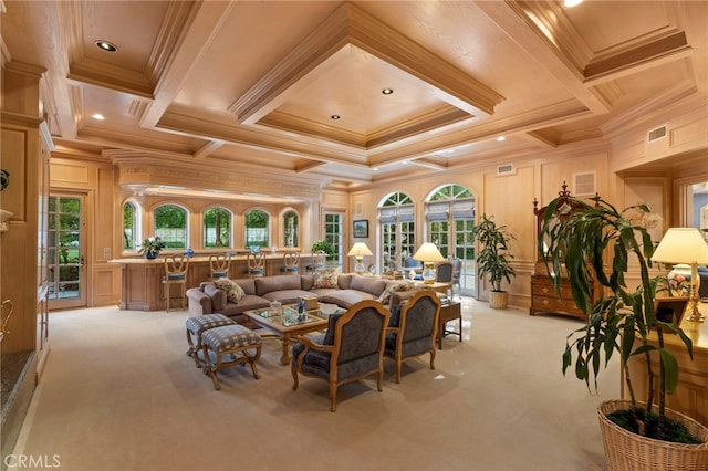 living room with a wealth of natural light, light carpet, and ornamental molding