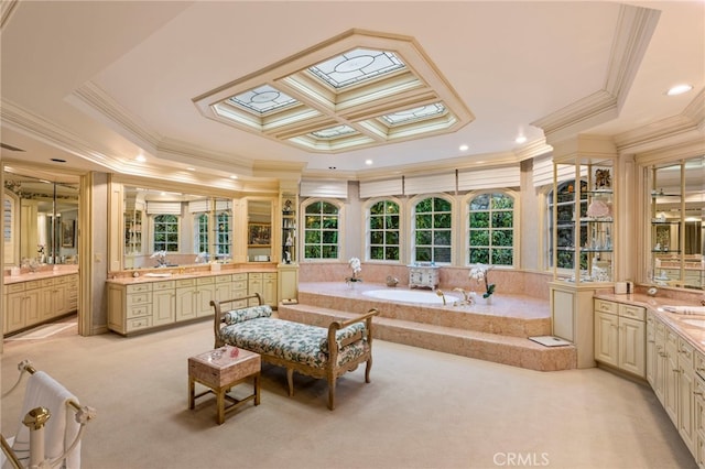 sunroom / solarium featuring coffered ceiling, a tray ceiling, and a skylight