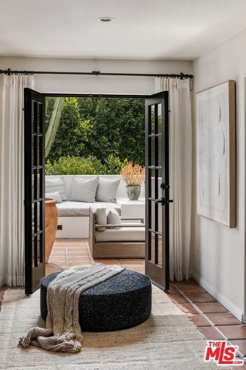 entryway featuring hardwood / wood-style flooring and plenty of natural light