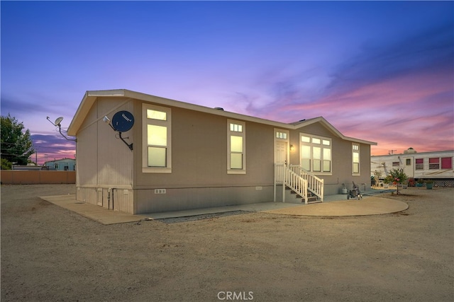 manufactured / mobile home with a patio area