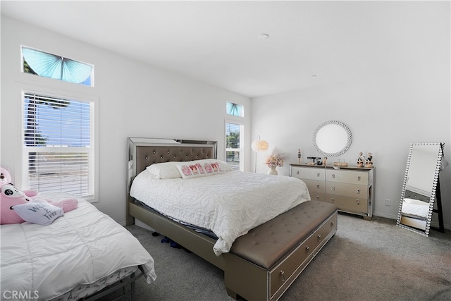 bedroom featuring carpet