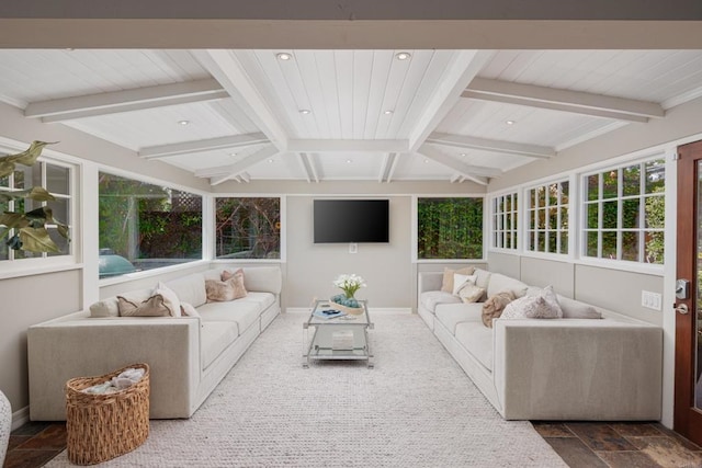 sunroom featuring beamed ceiling