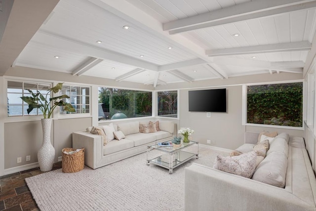 living room with beamed ceiling