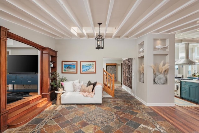 interior space featuring built in features and an inviting chandelier