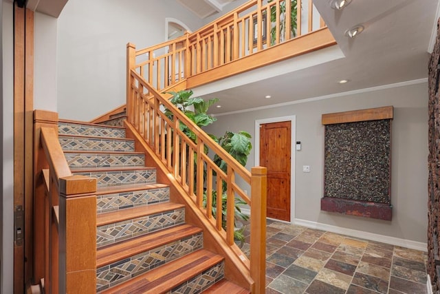 staircase with ornamental molding