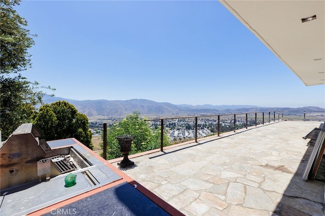 view of patio featuring a mountain view