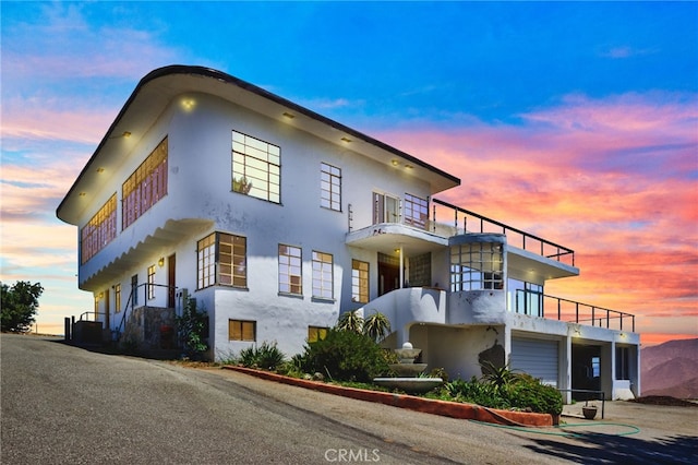 exterior space with a garage