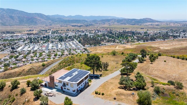 drone / aerial view featuring a mountain view