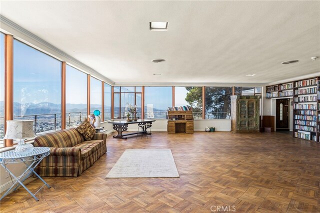 interior space featuring a mountain view and a healthy amount of sunlight