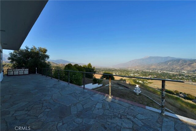 view of patio featuring a mountain view