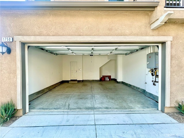 garage featuring water heater