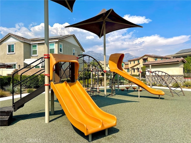 view of play area featuring a mountain view