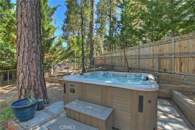 view of patio featuring a hot tub