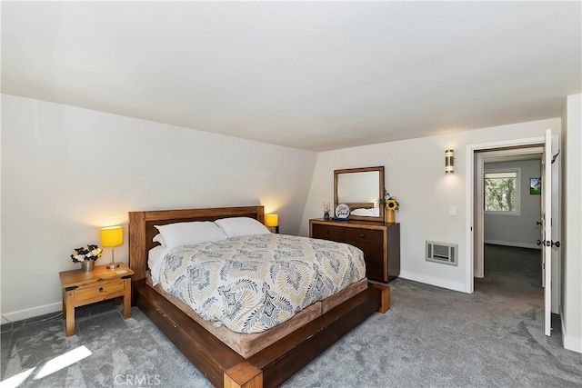 carpeted bedroom with heating unit