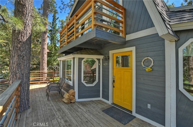 doorway to property featuring a deck