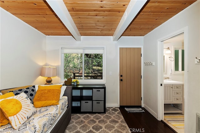 living area with beamed ceiling, dark wood-type flooring, and wood ceiling